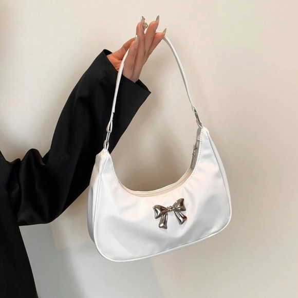 Handbags - White leather crescent moon shoulder bag with silver bow detail | NWT